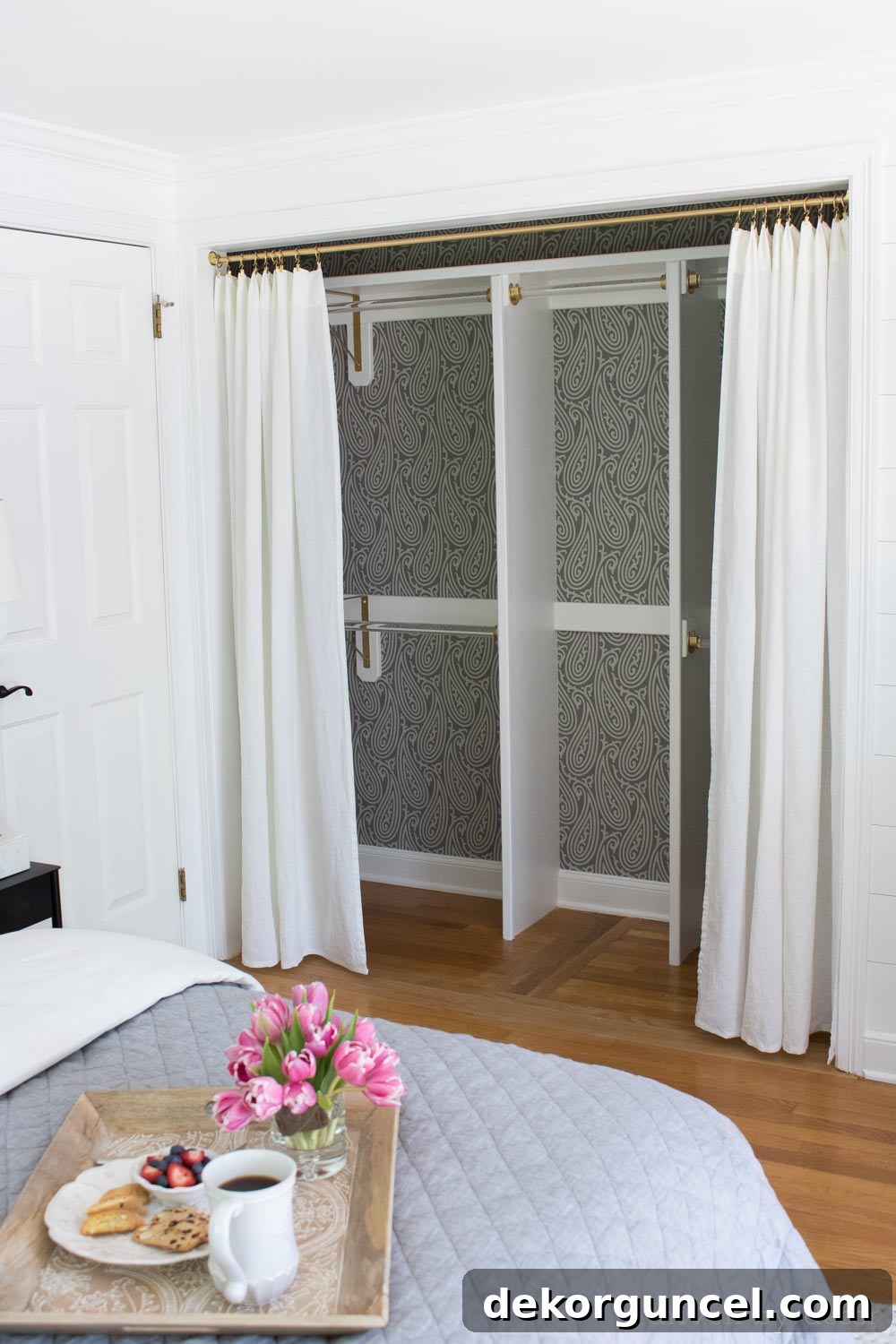 10 Creative Wallpaper Ideas for a Stunning Home Makeover 10 A brilliant wallpaper idea: adding a beautiful paisley wallpaper to the back of a closet transforms it into a stylish space.