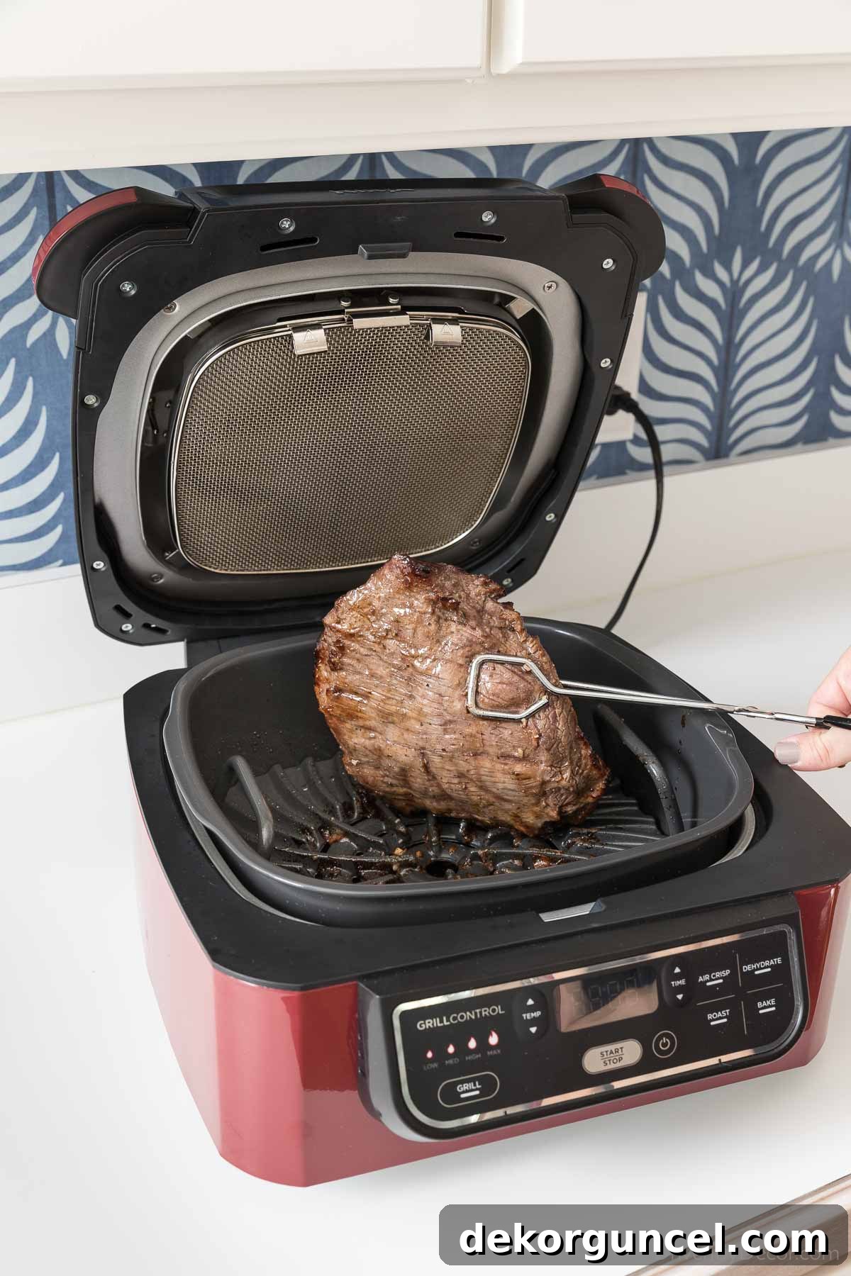5 Small Kitchen Game Changers And Where to Find Bargains 2 The Ninja Foodi indoor grill is a top small kitchen appliance, perfect for smoke-free grilling.