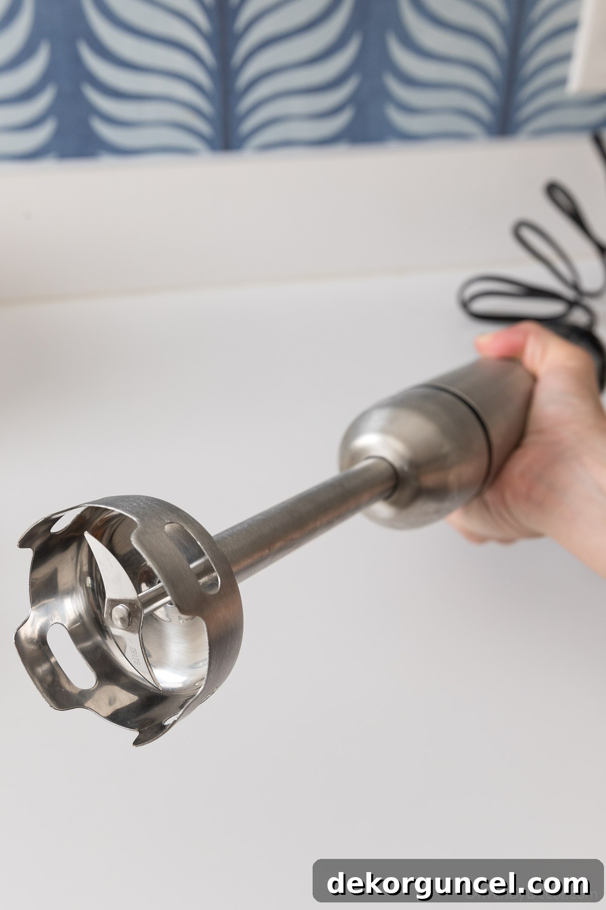 5 Small Kitchen Game Changers And Where to Find Bargains 5 This immersion hand blender is a space-saving alternative to a full-size blender.