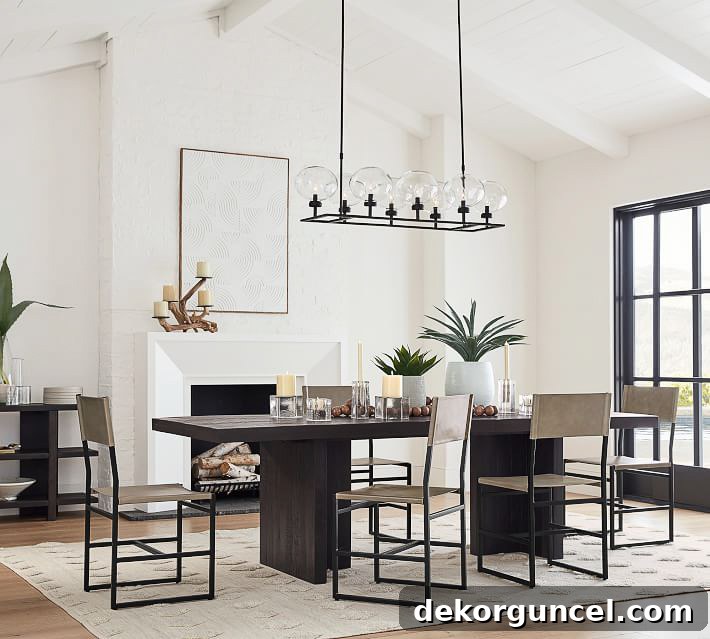A beautifully appointed dining room featuring an electric fireplace, creating a warm and inviting atmosphere for meals.