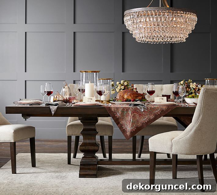 A sophisticated dining room showcasing an elegant wall with custom molding, serving as gorgeous and refined decor.