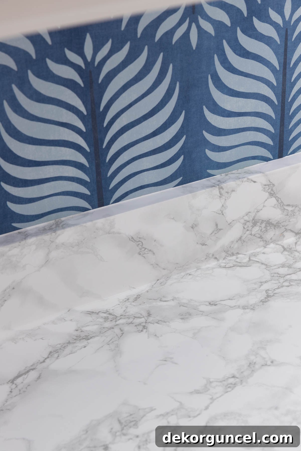 Seamless integration of contact paper on countertops and backsplash