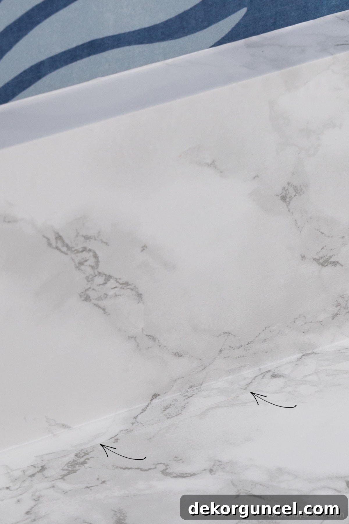 Close-up view of the contact paper seam on kitchen countertops