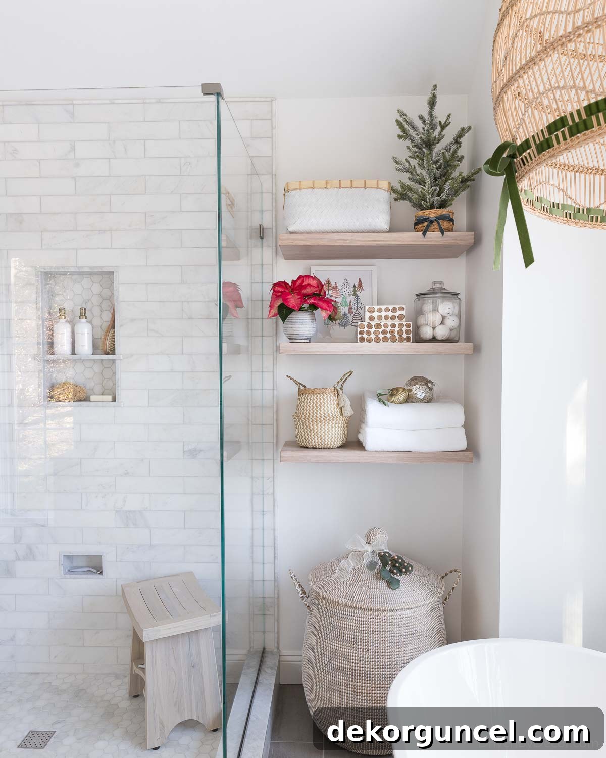 Flocked tabletop tree on a bathroom floating shelf, creating a simple Christmas decoration