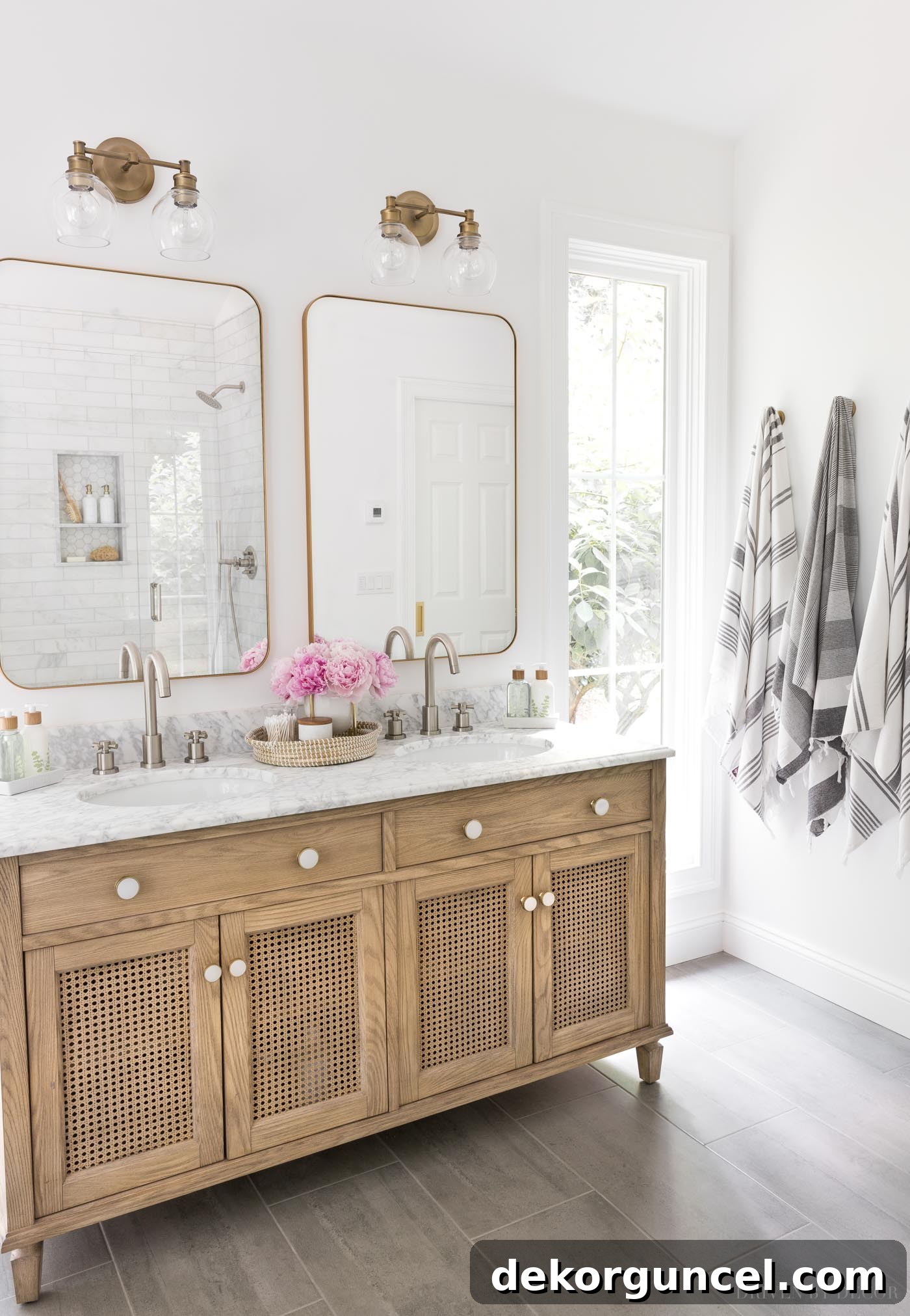 Love the white paint color in this bathroom - Benjamin Moore Chantilly Lace. This pure, crisp white creates a luxurious and serene atmosphere, perfectly complementing the elegant fixtures and finishes.