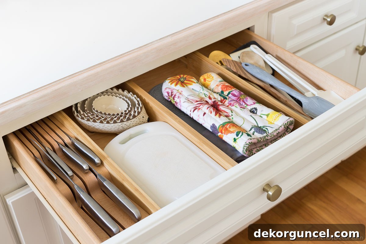 Expandable wood dividers are perfect for organizing your kitchen drawers!