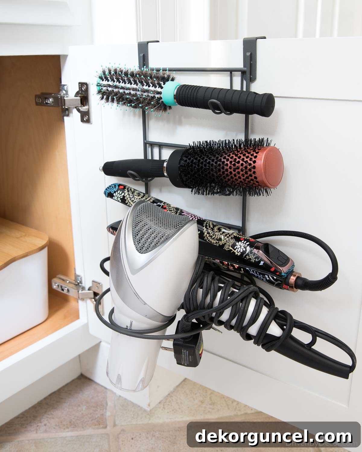 Smart Storage Hacks for Tiny Bathrooms 23 This organizer that hangs on the back of the bathroom cabinet door adds so much storage space!