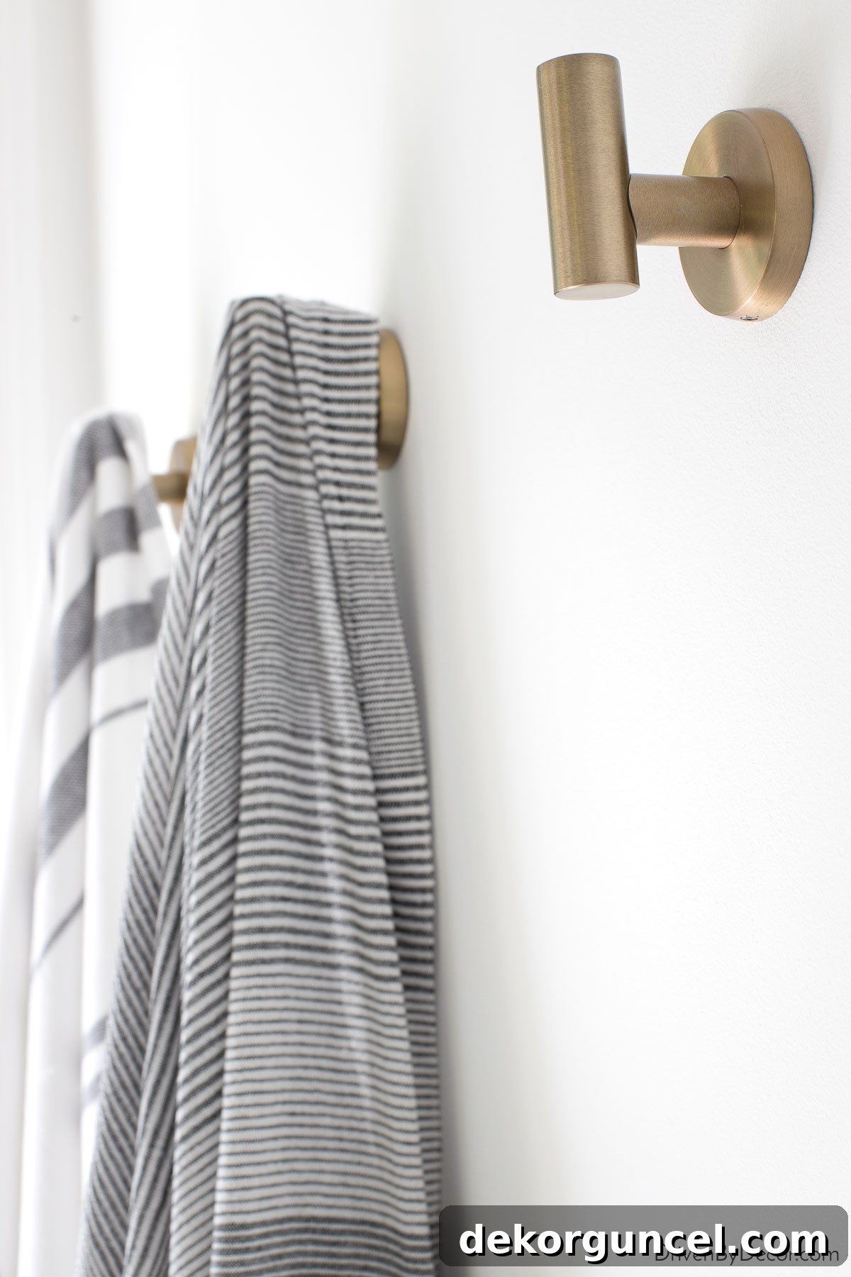 Smart Storage Hacks for Tiny Bathrooms 9 Using towel hooks instead of a towel bar saves space in the bathroom!