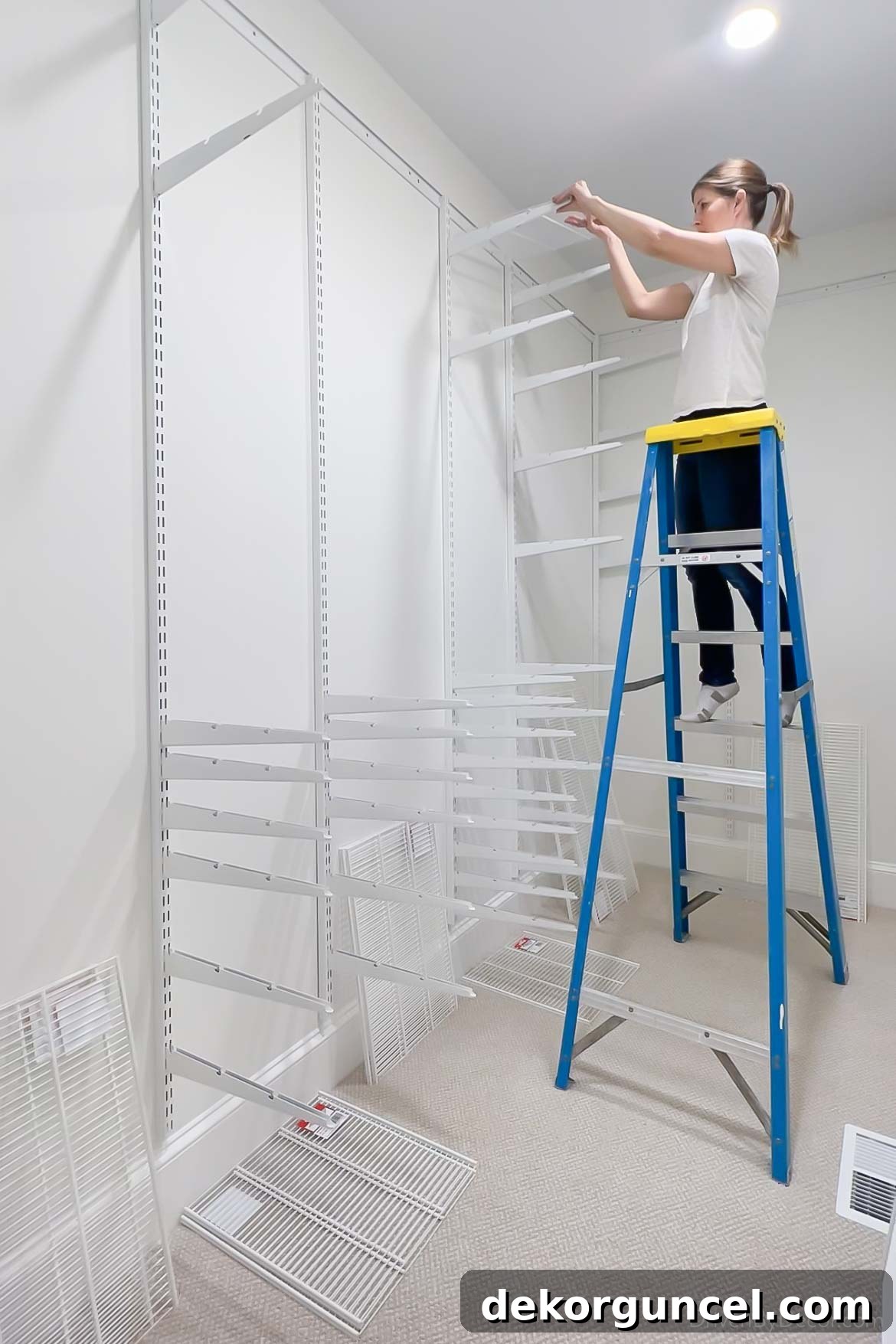 The straightforward installation of shelves into our Elfa closet system, creating essential horizontal storage space.