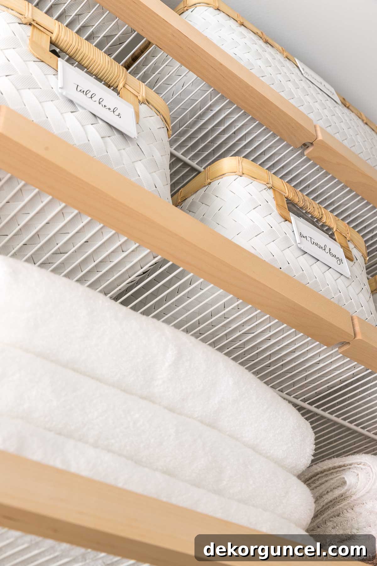 These perfectly sized baskets beautifully complement the Elfa Decor birch closet system, adding both function and style.