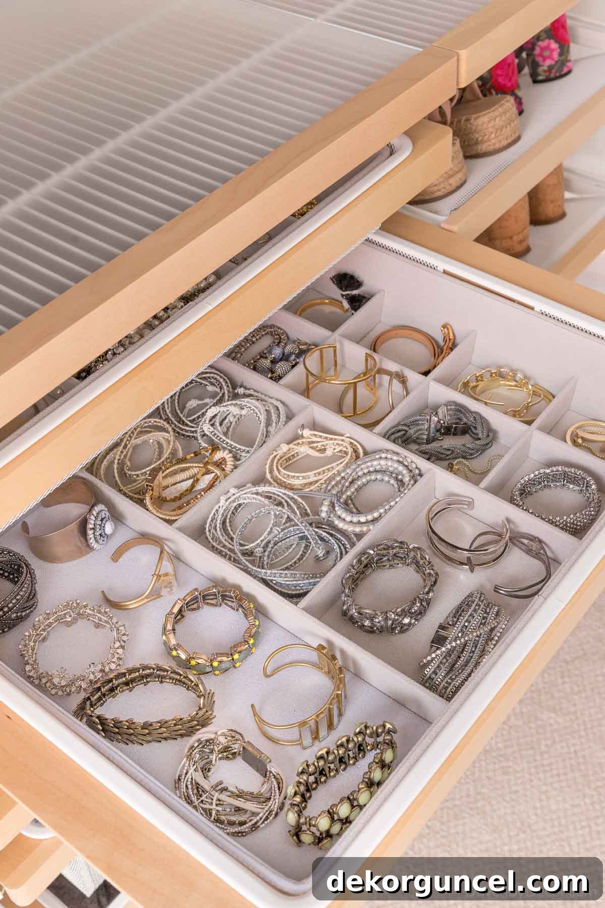 The efficient jewelry organizer integrated into our Elfa closet system, keeping accessories neat and accessible.