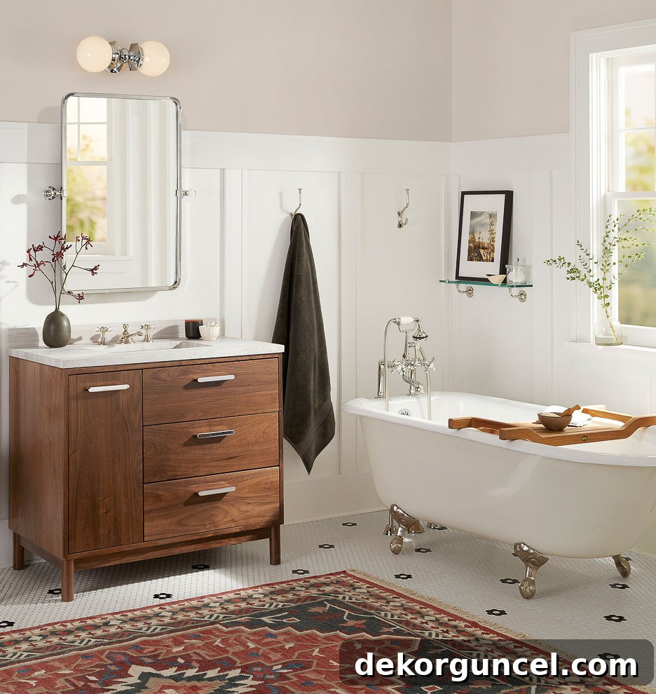 A modern bathroom featuring a stylish double globe sconce mounted horizontally above the mirror, showcasing versatile lighting installation.