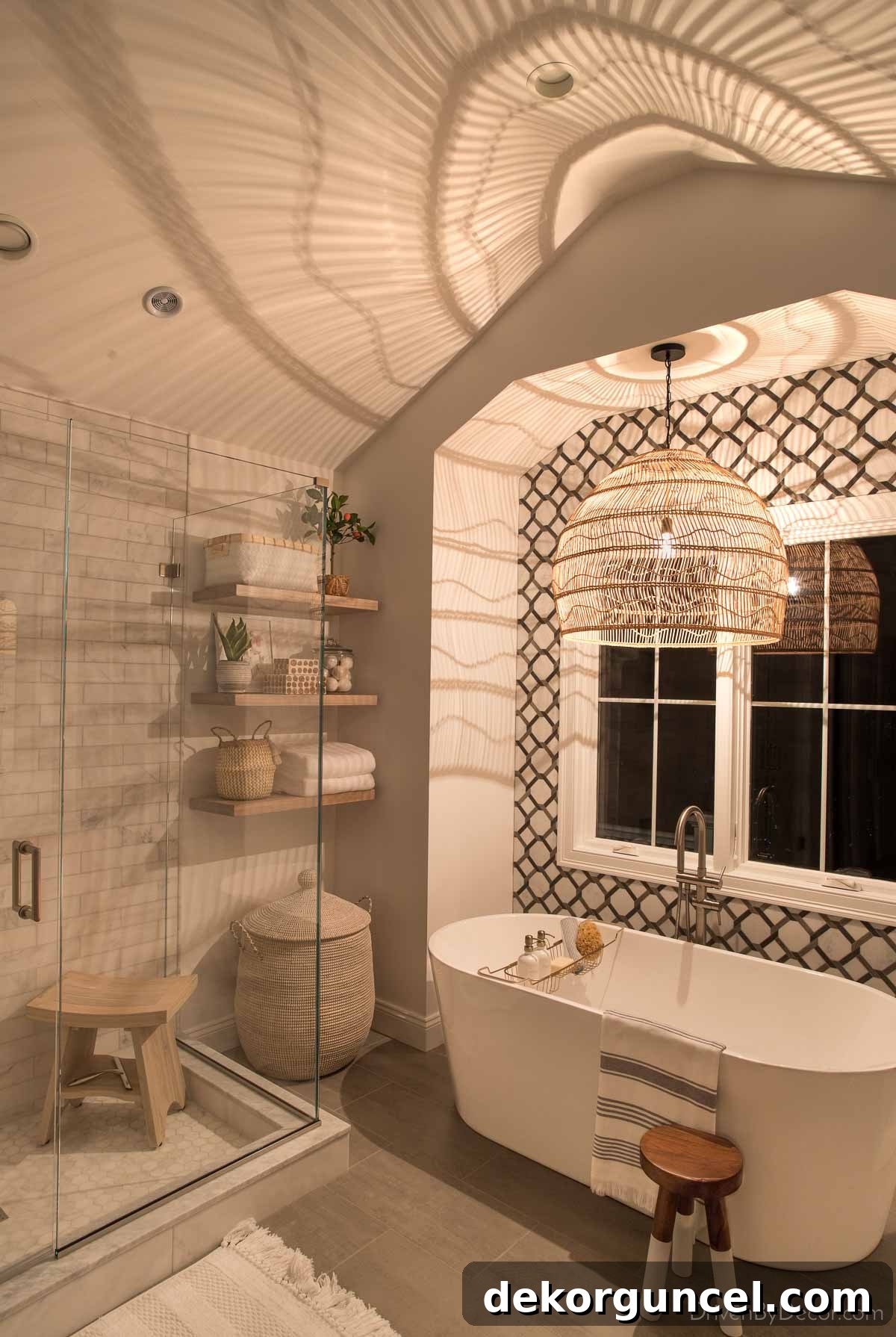 A serene bathroom featuring dimmable lighting from a pendant over the tub, creating a relaxing and luxurious ambiance.