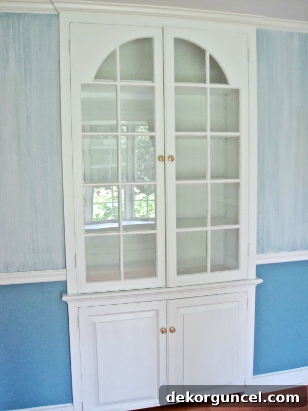 Before pic of built-in dining room china cabinet
