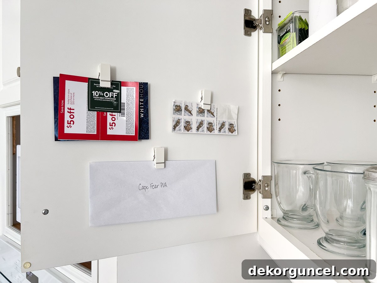 Brilliant Kitchen Cabinet Organization Hacks 20 Command clips added to the back of kitchen cabinet doors - great organization idea!