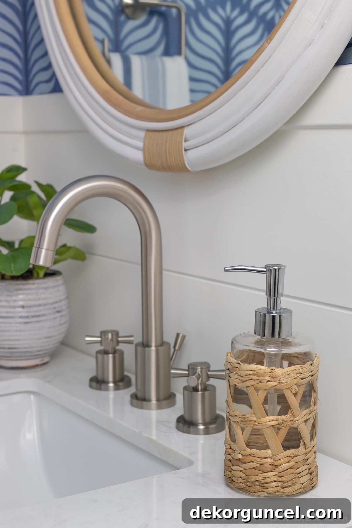 A beautifully textured woven soap pump sitting on the vanity in our hall bathroom, enhancing the natural and organic aesthetic