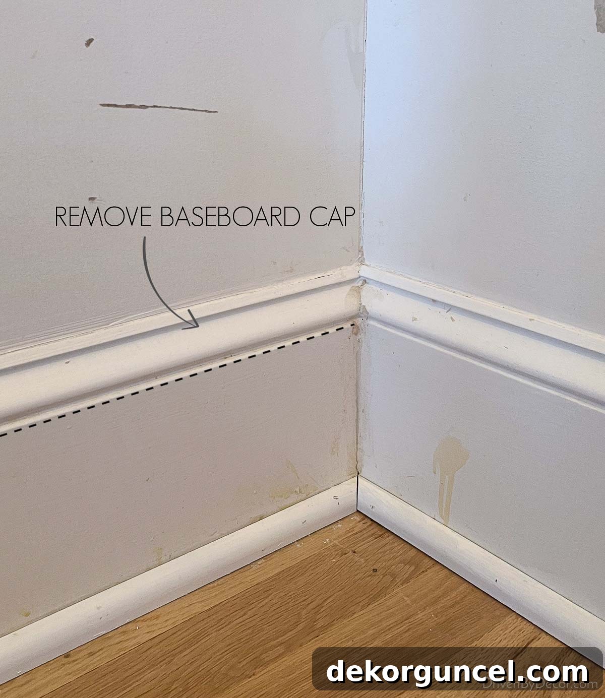 Detail shot of the baseboard cap removed to facilitate a smooth shiplap installation in our hall bathroom