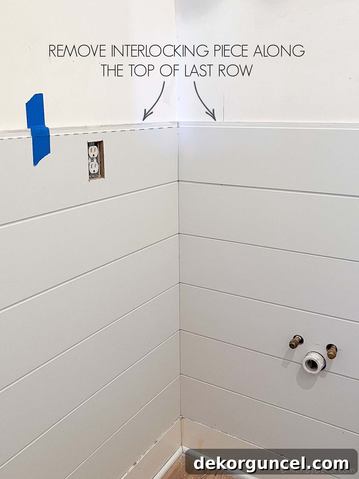 Demonstration of how to prepare and install the final row of shiplap, showing the top tongue piece removed for a clean finish