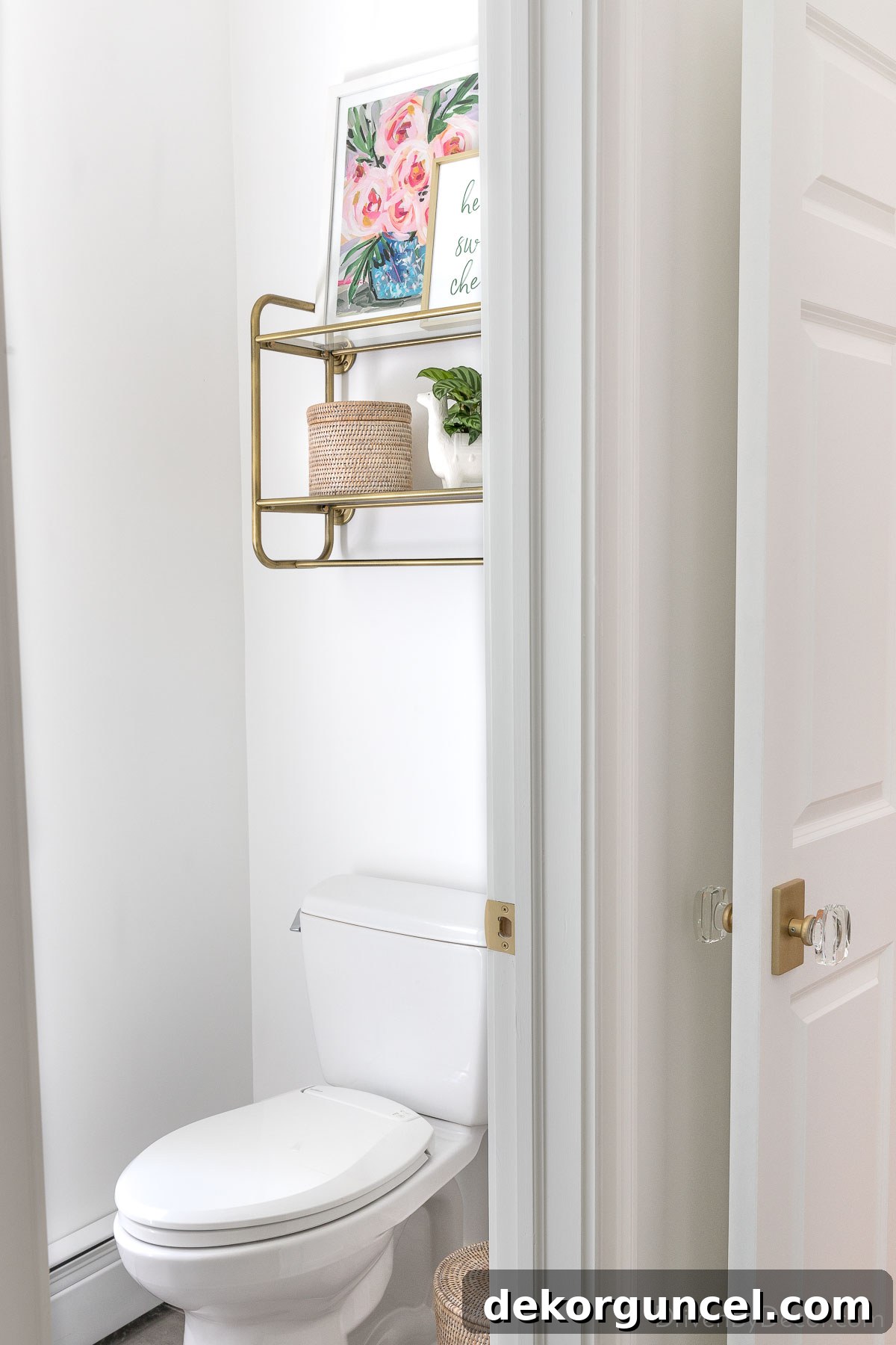 Unlock Vertical Space: Over-The-Toilet Organization 4 Open brass shelving over toilet