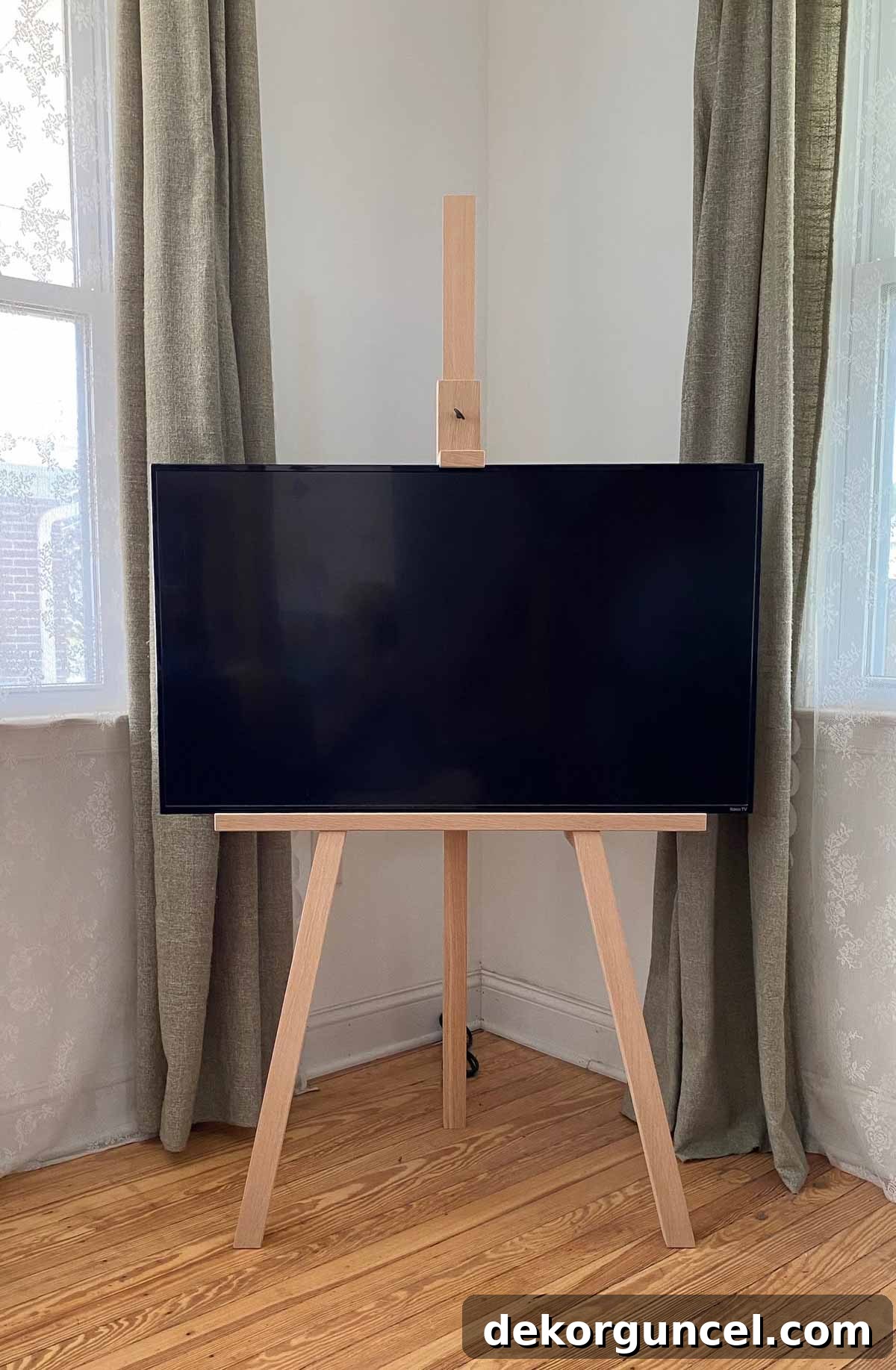 Maximize Your Living Room Corners 10 Brilliant Ideas 14 Wood TV easel in living room corner