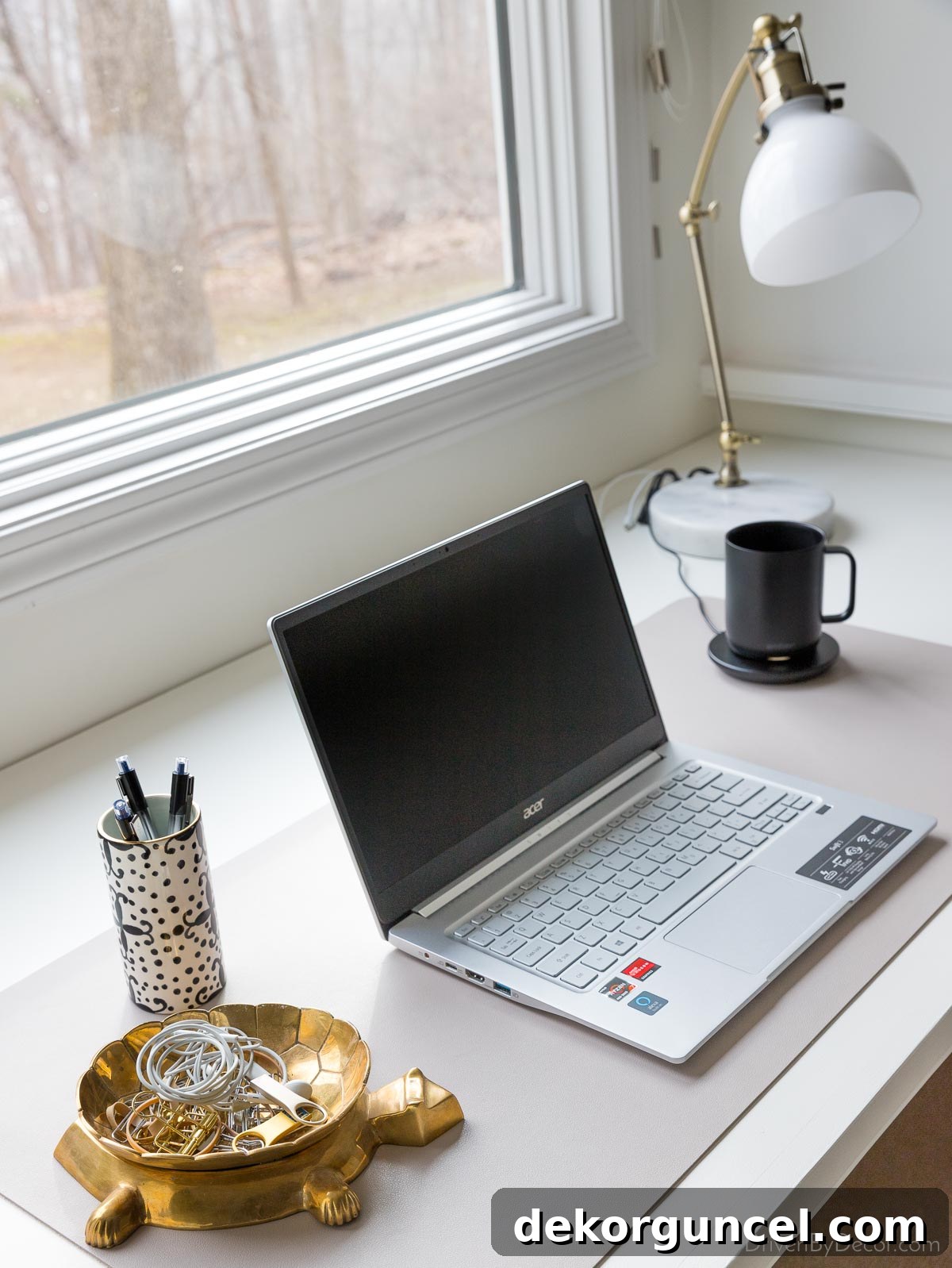 Ember smart mug at a desk, keeping coffee at a preferred temperature all day, a perfect Father's Day gift for remote workers.