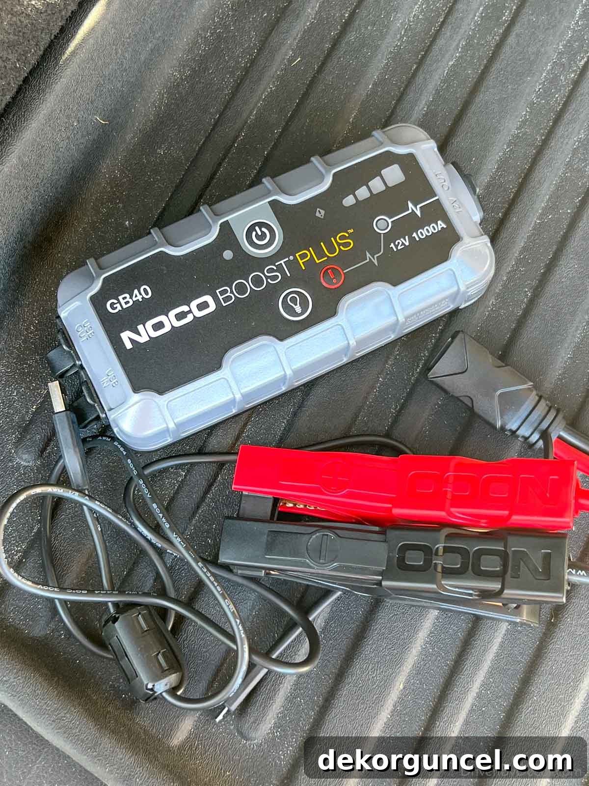 Portable jump starter for cars, also functions as a power bank and flashlight, ideal for roadside emergencies and a great Father's Day gift.