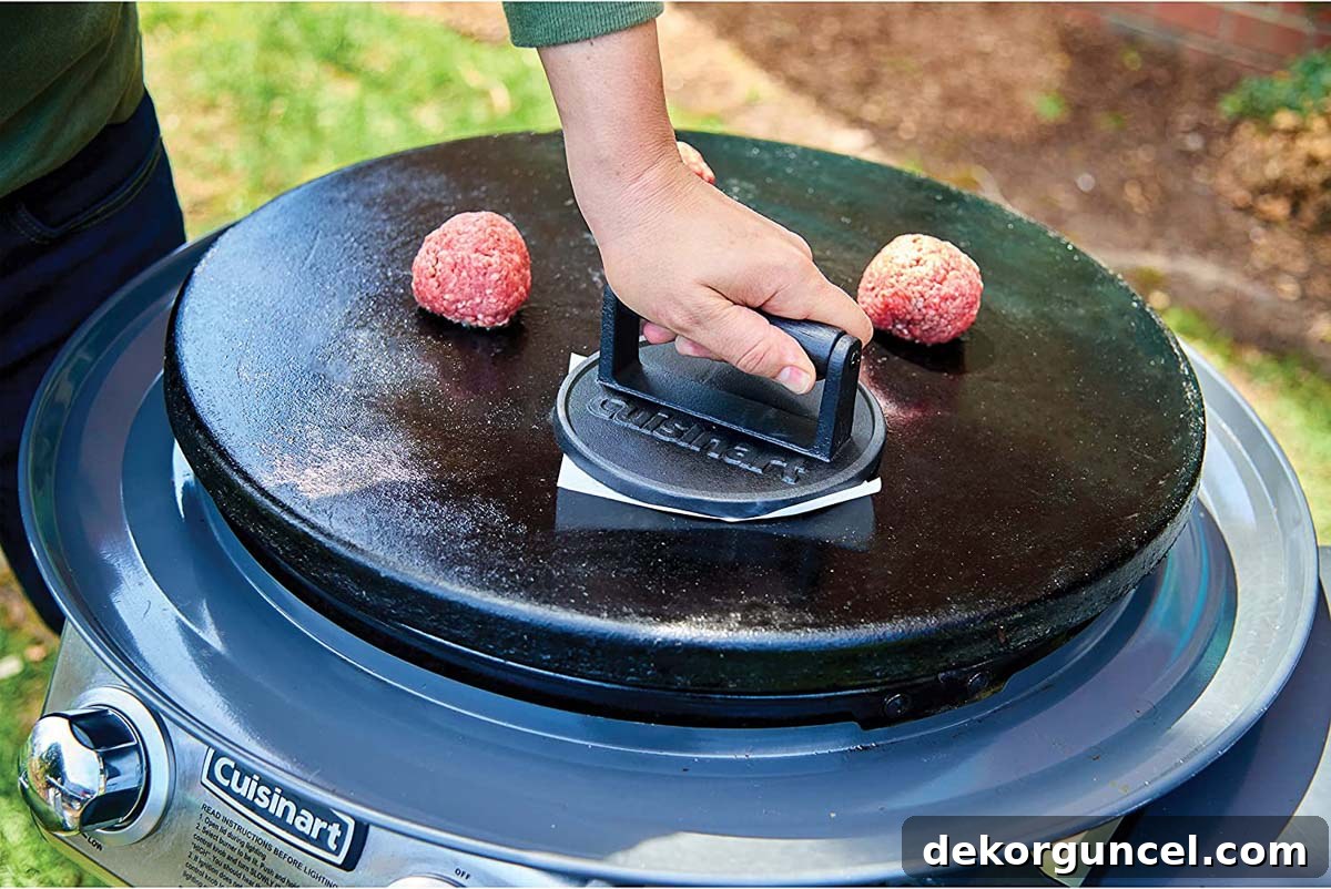Cast iron press for making delicious smashed burgers, perfect for achieving crispy edges and quick cooking.