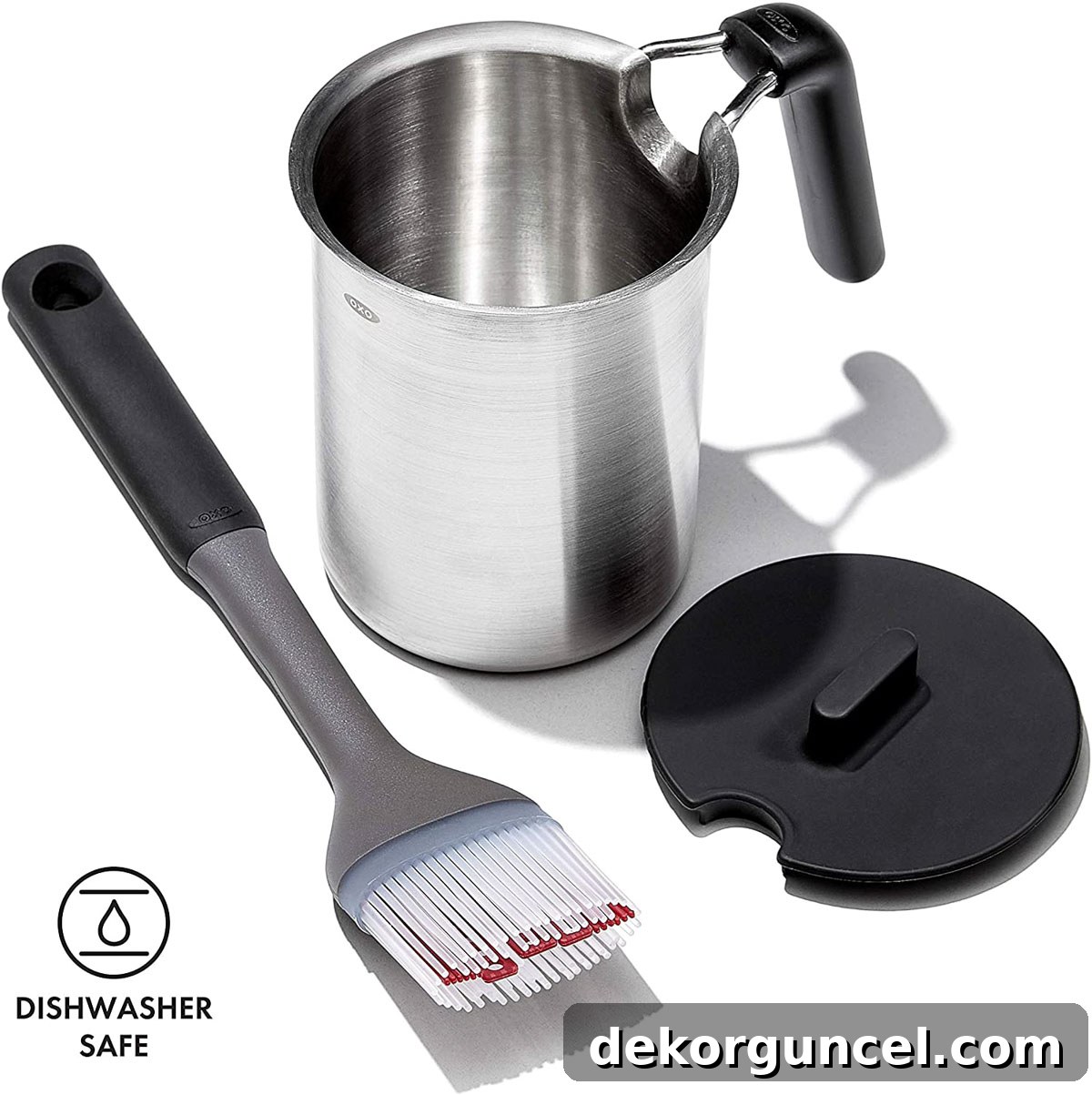 Basting pot and brush set with a long handle and silicone bristles, ideal for marinades and BBQ sauce.