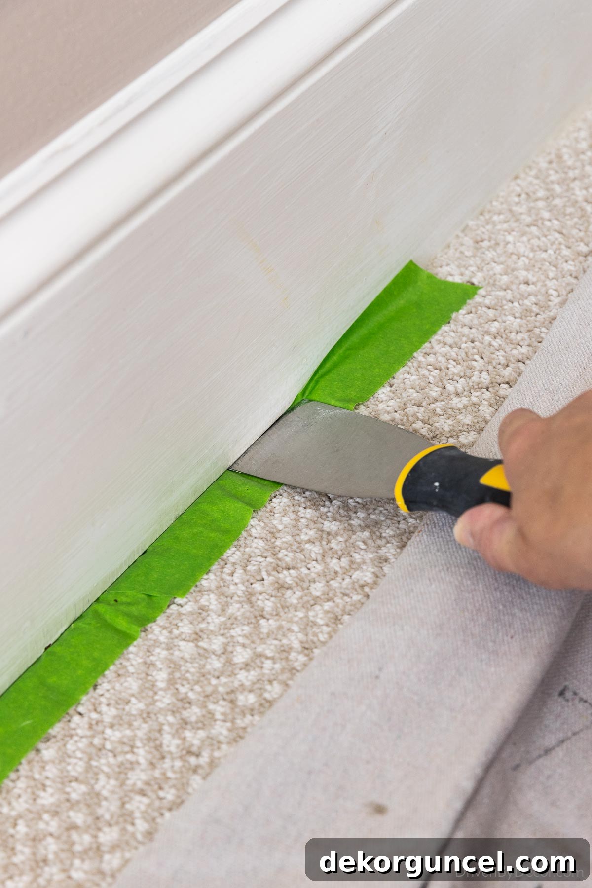 Master Room Painting: 10 Easy Steps for a Perfect Finish 17 Place painter's tape under baseboard to protect flooring