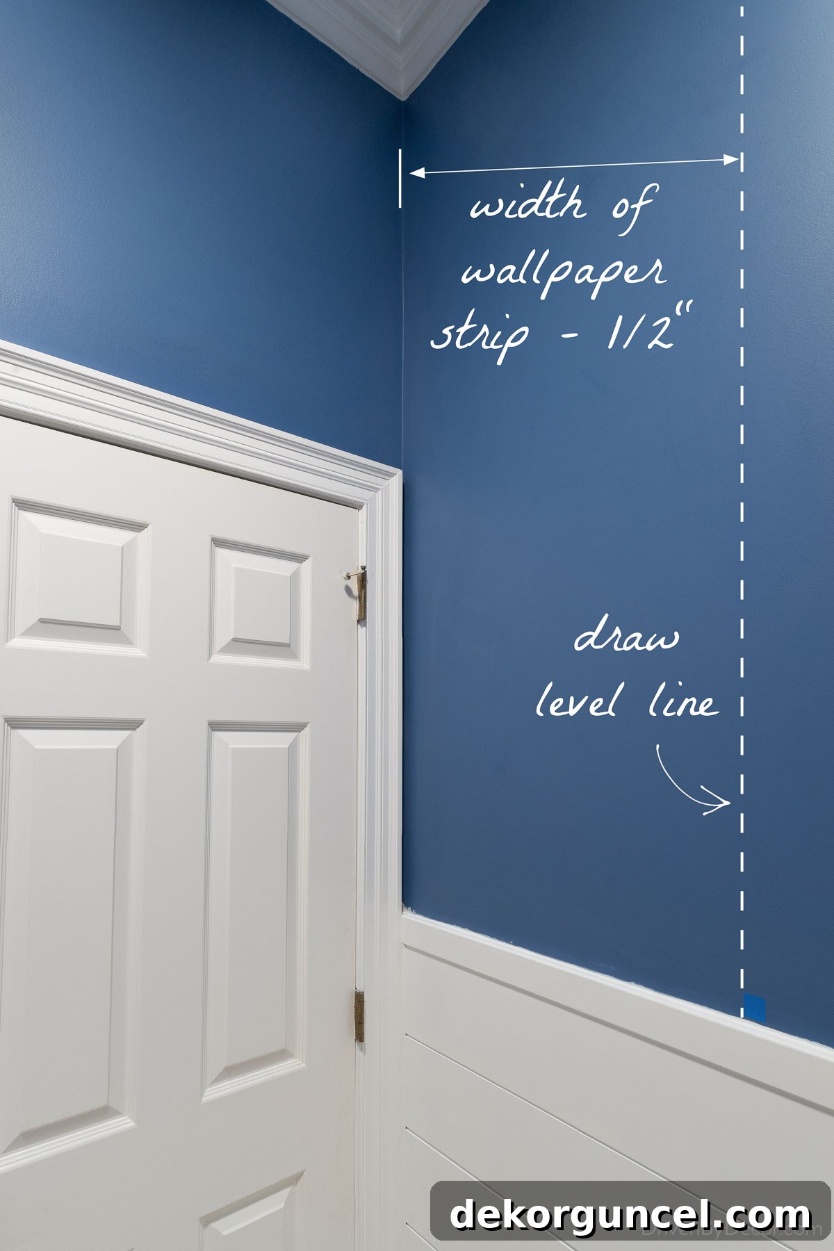 Drawing a level line on the wall with a 48-inch level, crucial for the straight installation of the first wallpaper strip.
