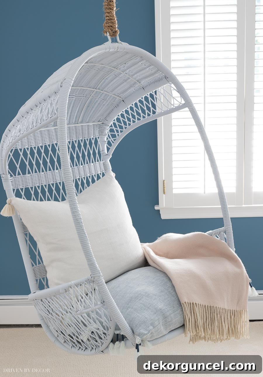 Loving this hanging swing chair! So perfect for a kids room!!