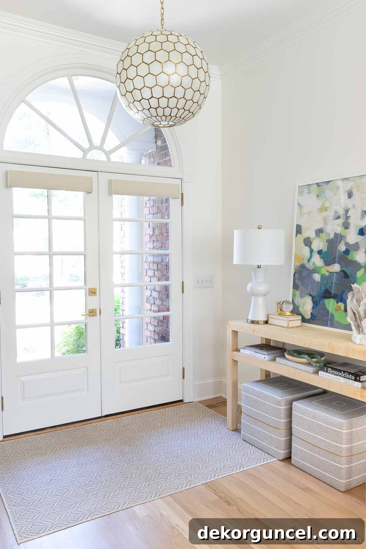 Rug over hardwood floors in the entryway