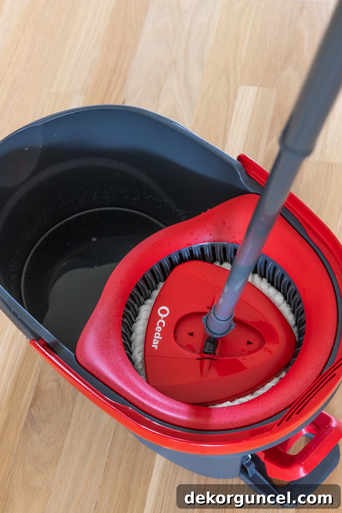 The spin mop system for cleaning hardwood floors