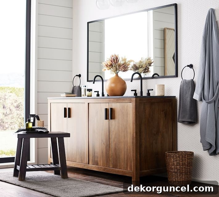 A double wide mirror over a double bathroom vanity - love this bathroom mirror idea!