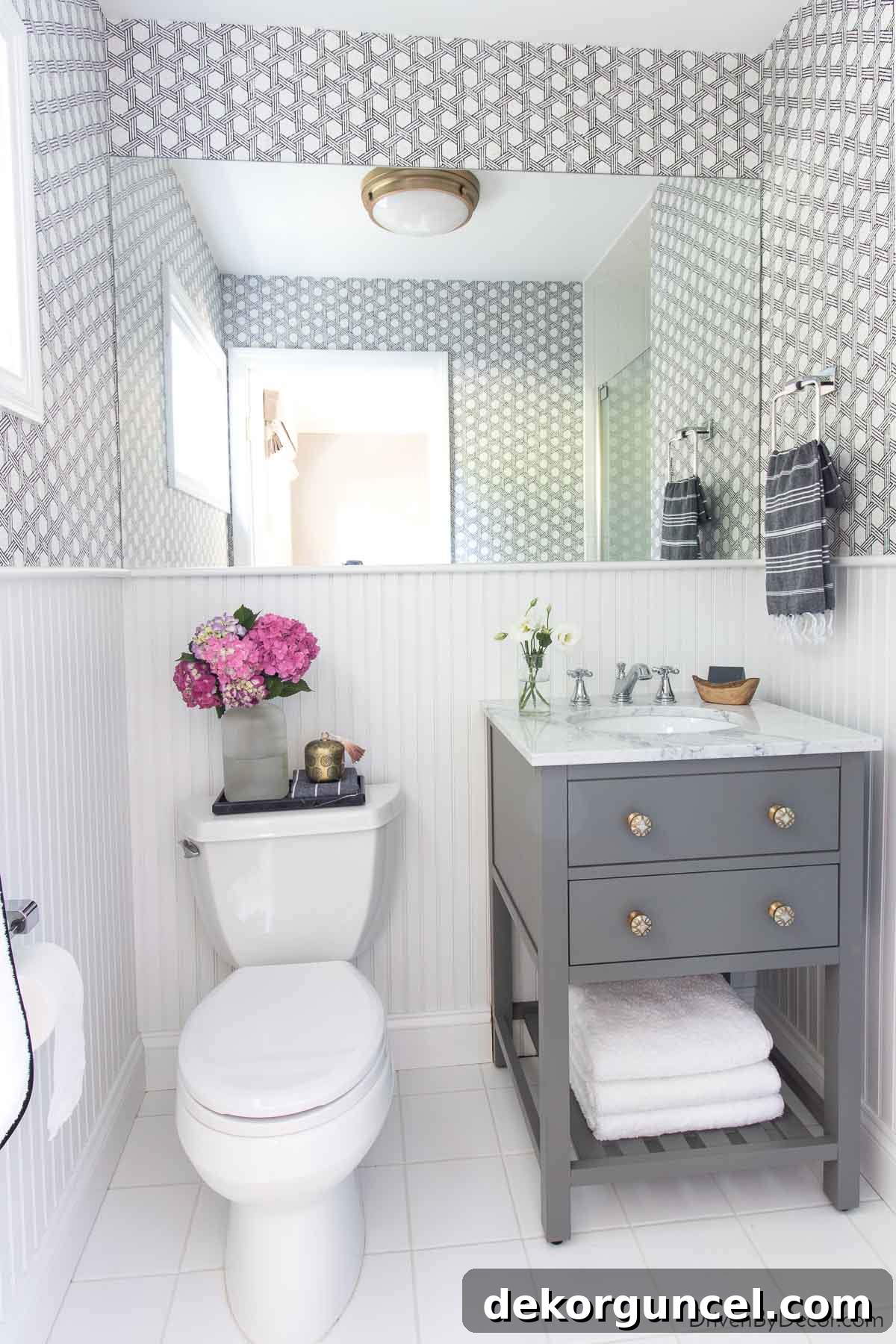 Small bathroom with large mirror that could be framed out