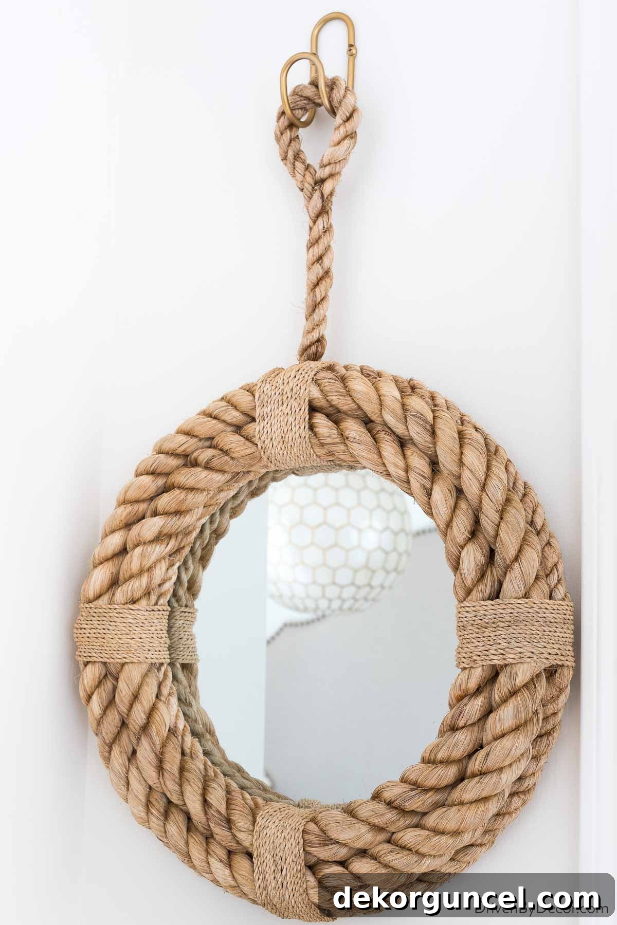 Rope mirror hung with hook turned gold with Rub 'n Buff