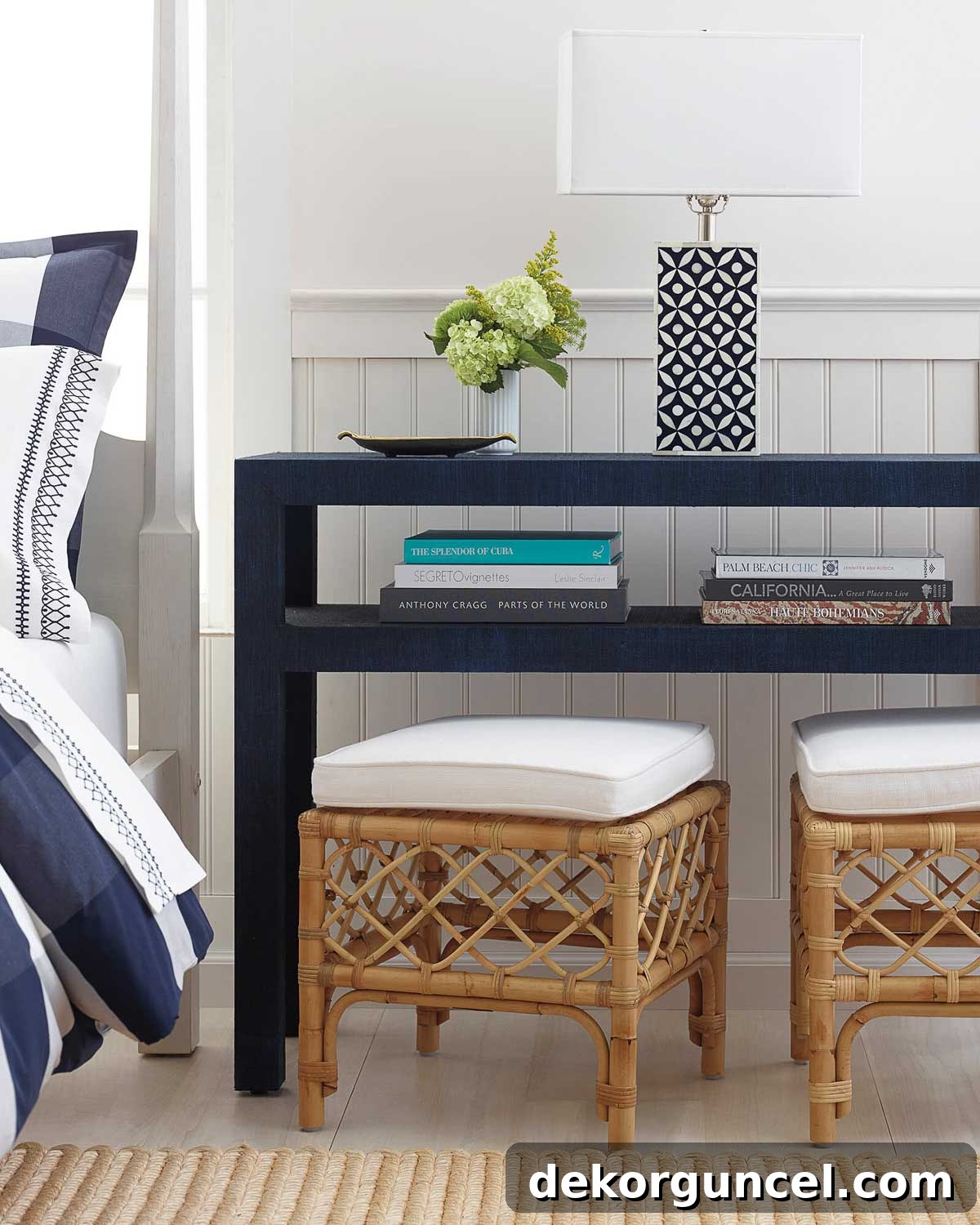 A pair of rattan stools tucked under a console table for both style and function