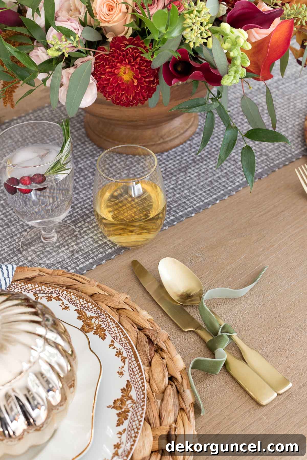 Velvet ribbon tied silverware for a fall dinner