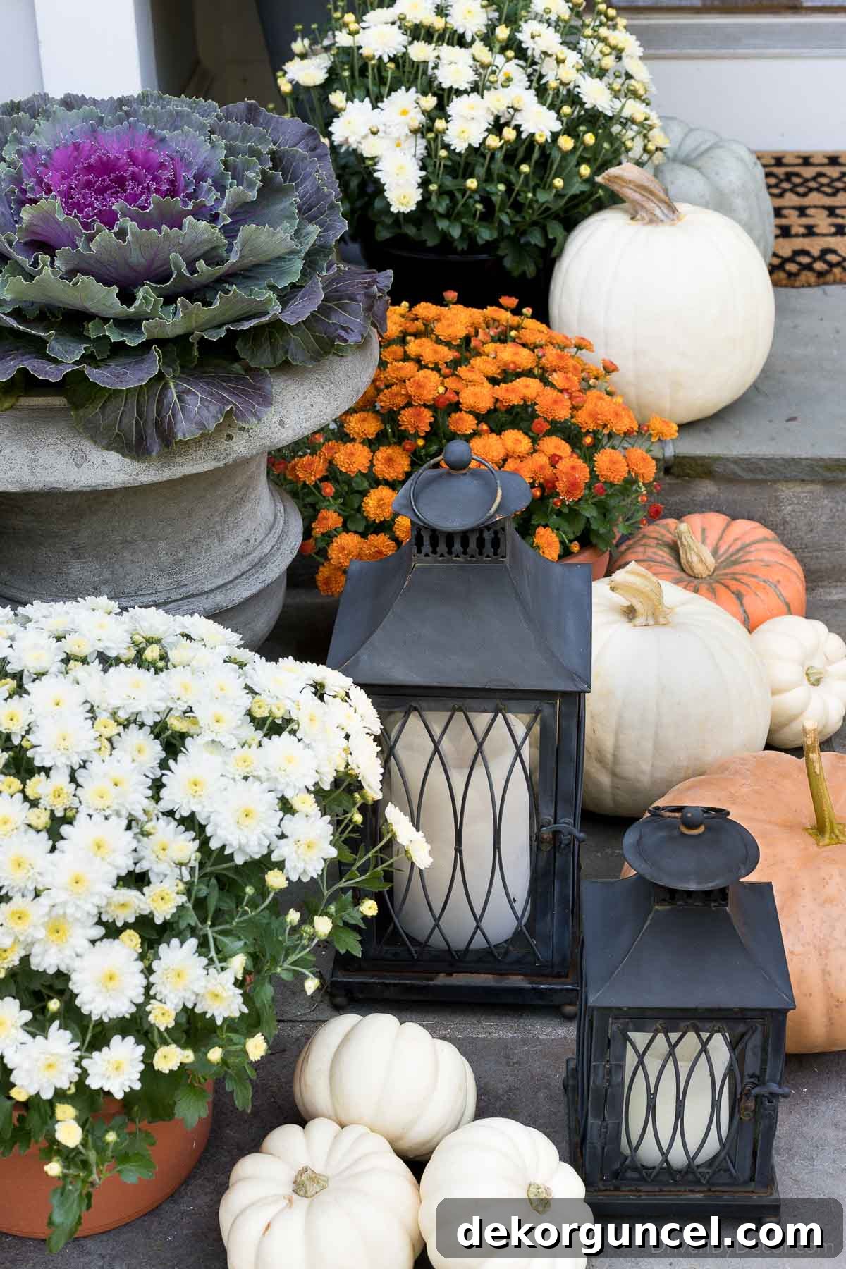 Fall porch decor - mix of lanterns, mums, pumpkins, & cabbages