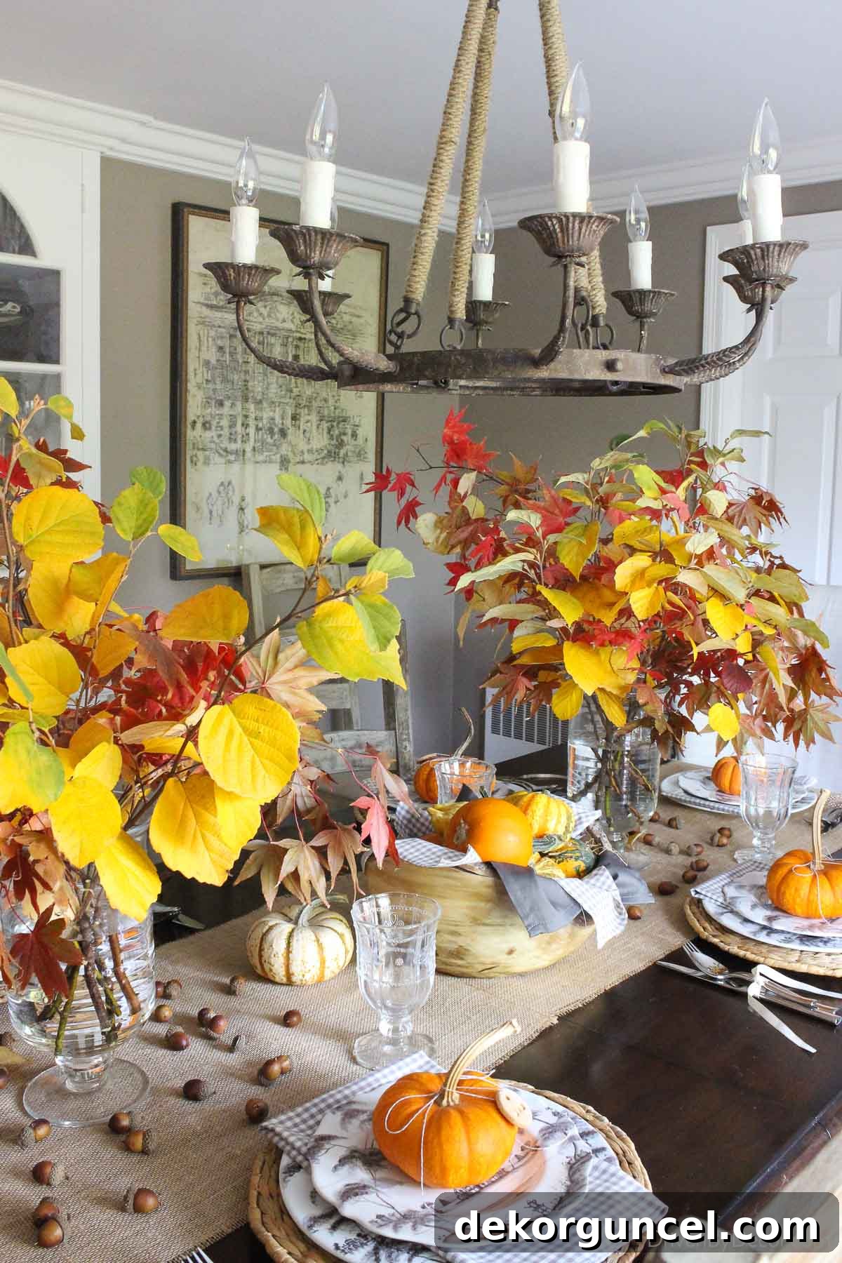 Fall table with vases of leafy branches