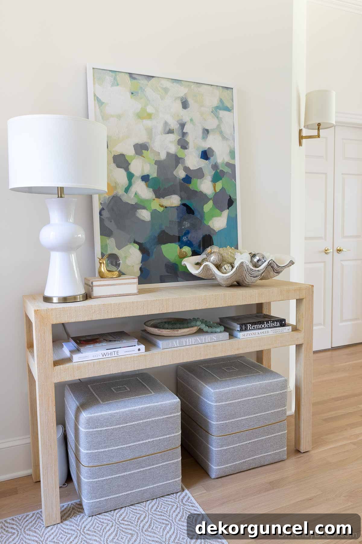 Our entryway console with decorative giant clamshell, adorned for the holidays