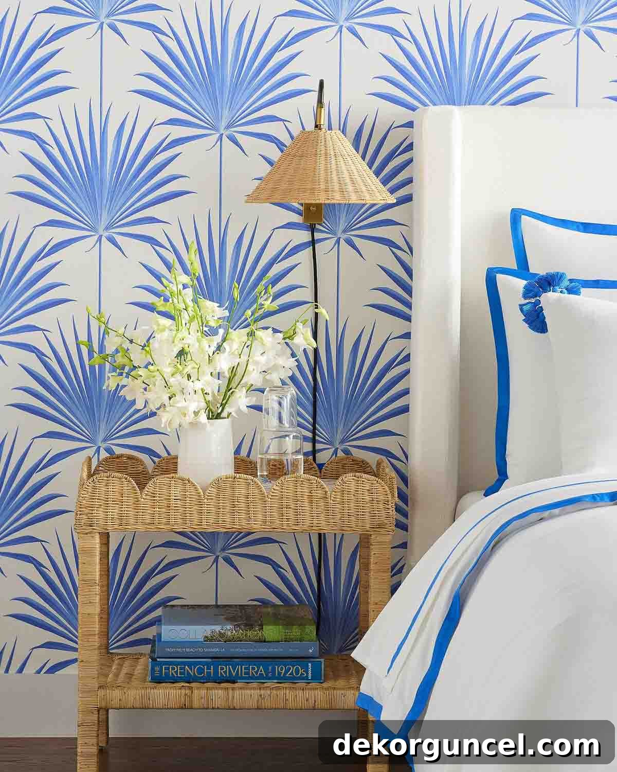 Scalloped rattan side table used as nightstand, blending elegance and practicality