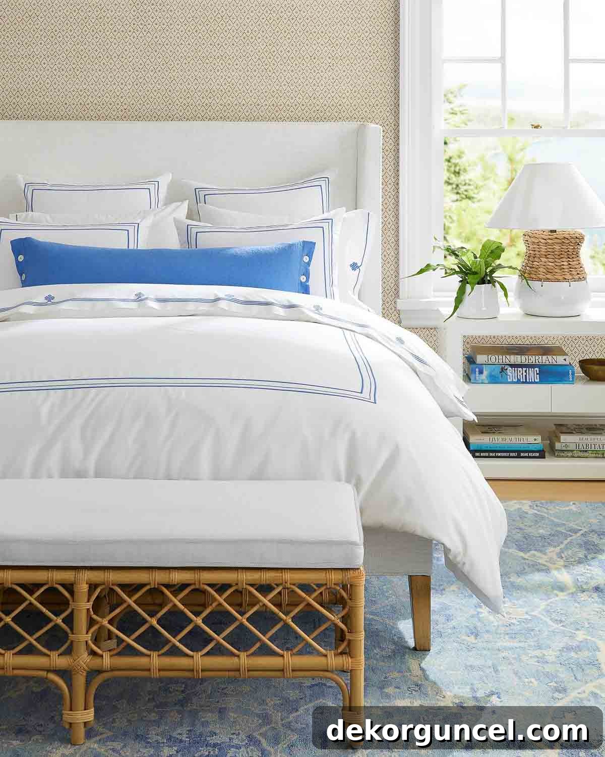 Rattan bench at the end of a bed, adding natural texture and functional elegance
