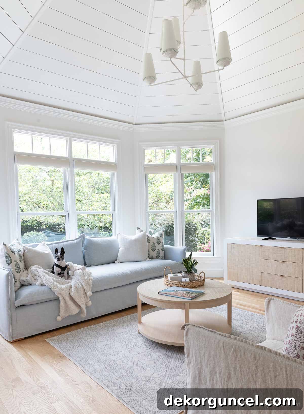 Sofa and console in our sun room, showcasing a beautiful and durable upholstered piece