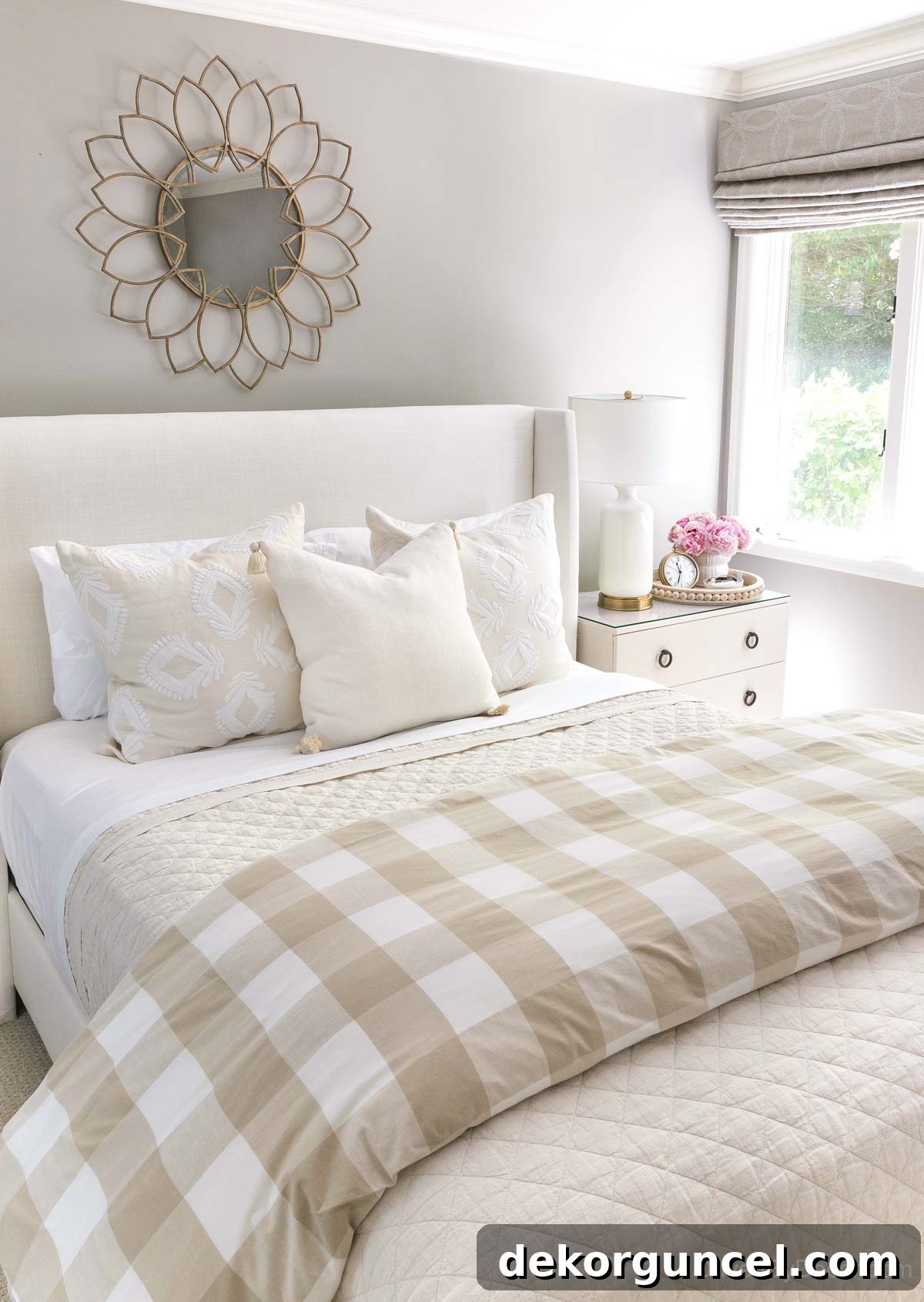 Serene guest bedroom featuring neutral tones and elegant decor
