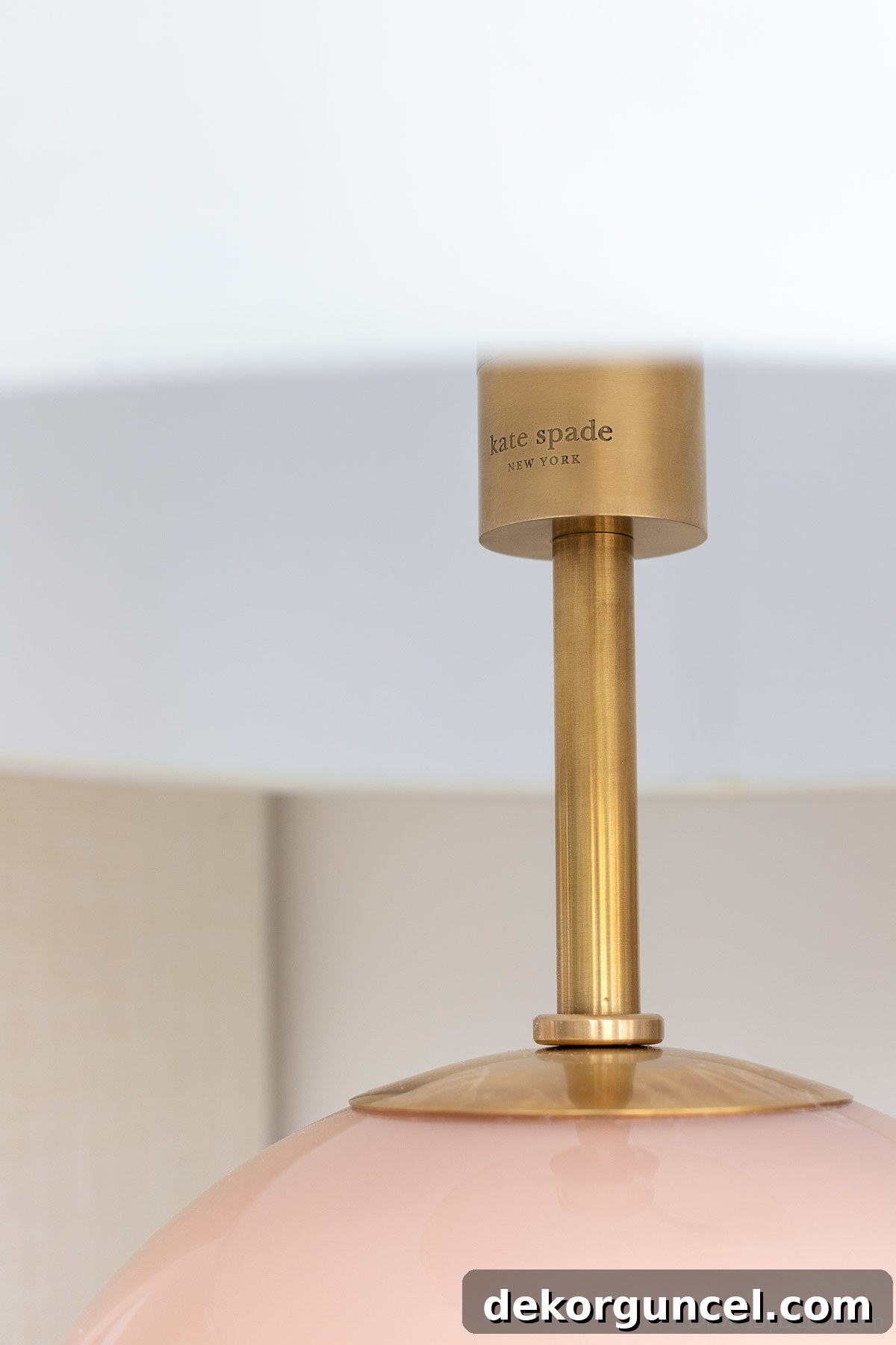 A modern bedroom lamp with a clean design, highlighting the absence of a traditional turn switch knob for a minimalist aesthetic
