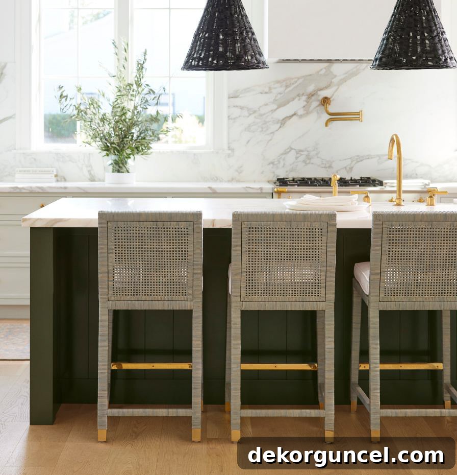 Marble slab used as a dramatic kitchen backsplash, illustrating the 2023 design trend of statement marble with bold veining