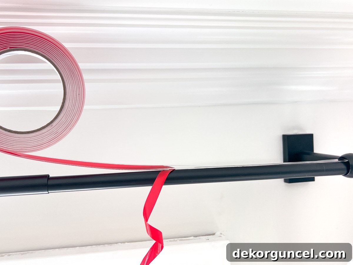 Applying curtain ring glide tape 