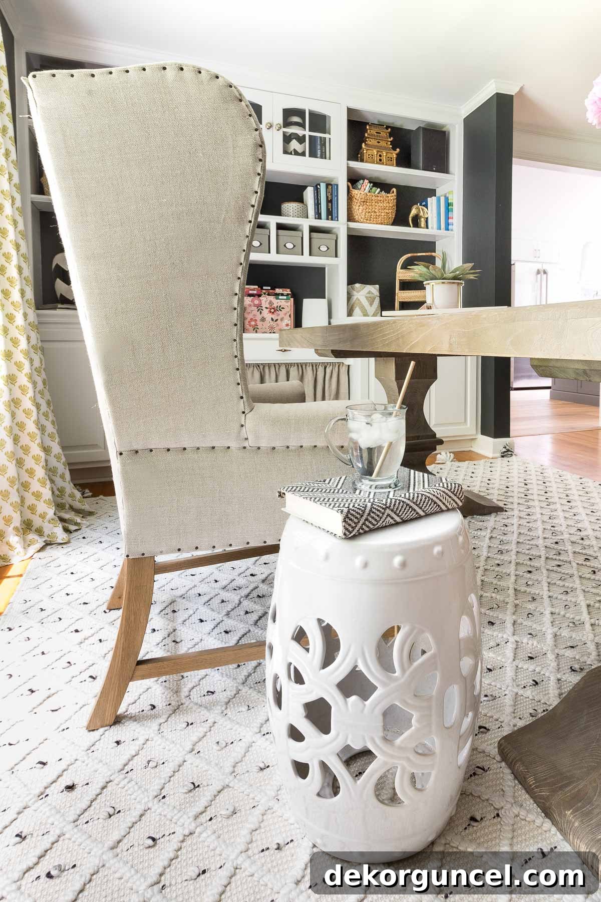 7 Frugal Back Porch Design Secrets 17 White garden stool next to a desk chair in an office, illustrating its seamless indoor versatility