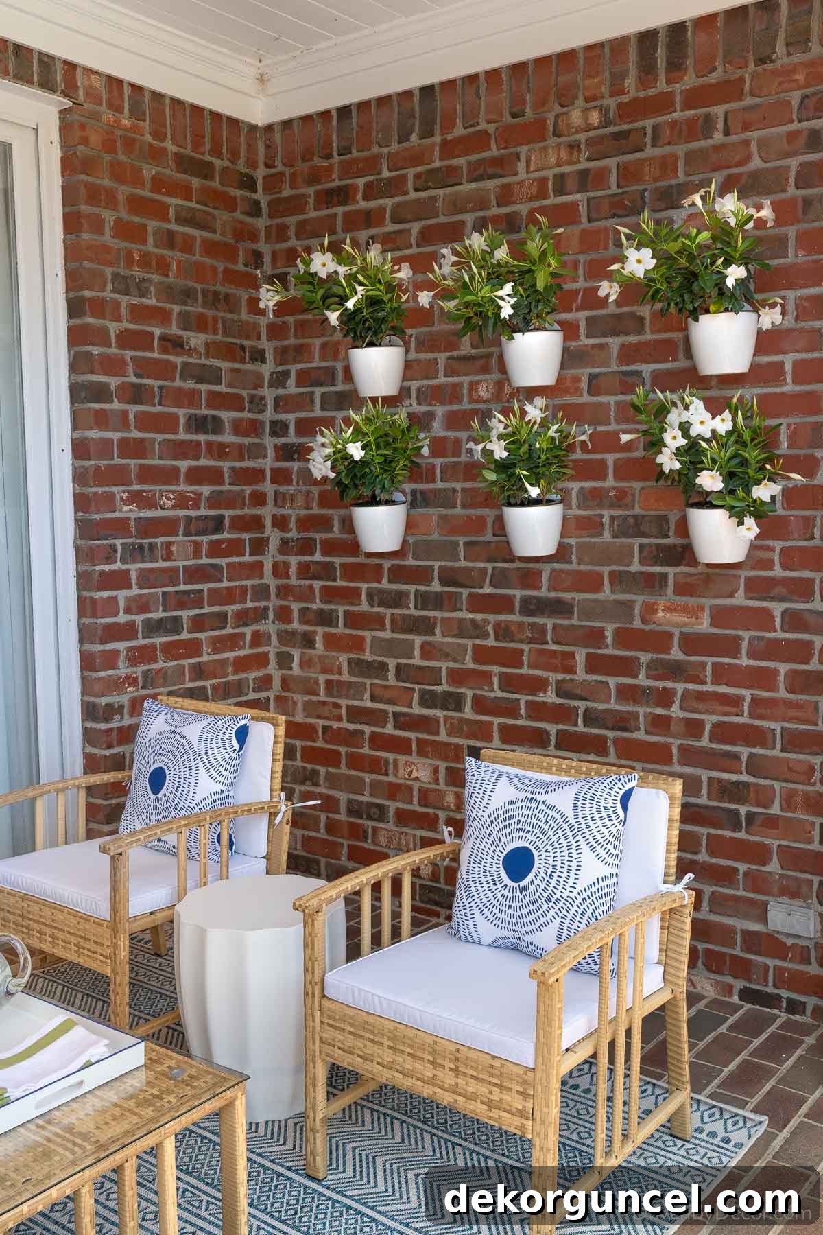 7 Frugal Back Porch Design Secrets 7 Plants beautifully hung on a brick wall of a back porch, creating a stunning green wall effect